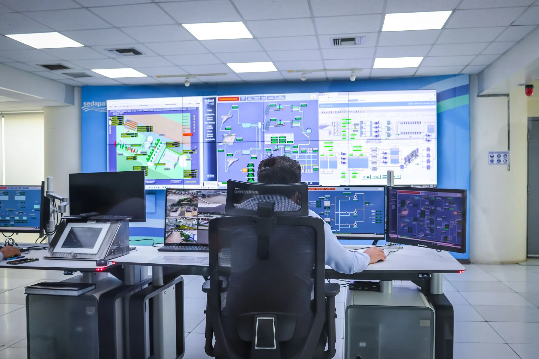 Secure server room with glowing LED lights, representing endpoint data protection standards.