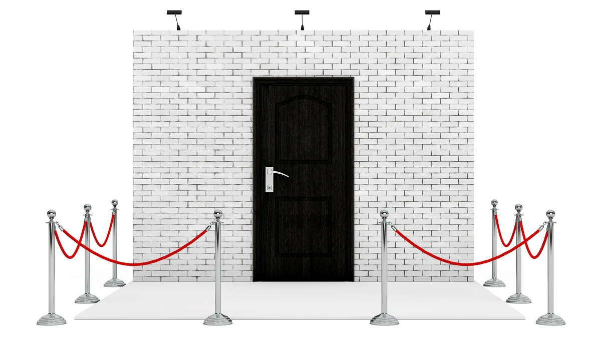 Une lueur rouge tranchant l'obscurité d'un mur, image du filtre qui bloque les menaces.